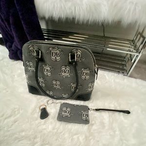DB w/ wristlet & key chain, black, silver hardware,pocket inside, like new